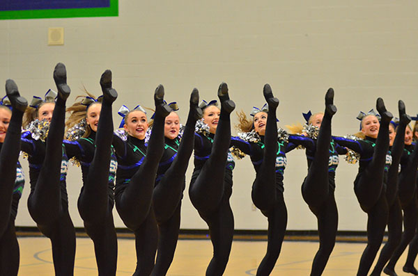 Touch of Silver performs a competition routine at a home basketball game on Thursday, December 8. They performed the same routine at a competition on Saturday, December 10.