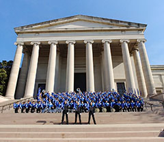 Jaguar Pride Marching Band stands in front of the National Gallery of Art.