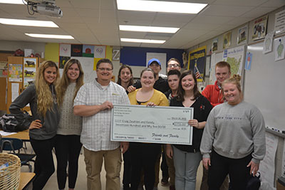 Student planned auction to help South teacher