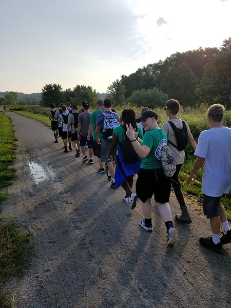 Cadets in the Blue Springs South Air Force JROTC program march along the Little Blue Trace in remembrance of the Bataan Death March during World War II. Photo courtesy of BSSHS Air Force JROTC