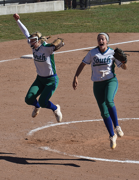 Easton Seib, left, and Addie Lightner celebrate as the Jaguars record the last out of the Class Four softball state championship game on  Saturday, Oct. 27, 2018. The Jags beat Troy Buchanan 2-0 to win Souths first state title in softball.