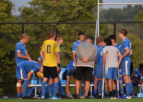 Members of South’s varsity soccer team in a huddle before a playing a home game against park hill.
Photo by Shyia Patrick