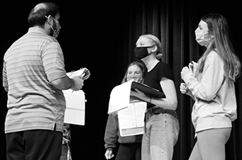 Theatre teacher Tim Haynes rehearses with junior Elizabeth Ralston and Riley Berridge. South students recently performed Puffs. Photo by Matt Coleman