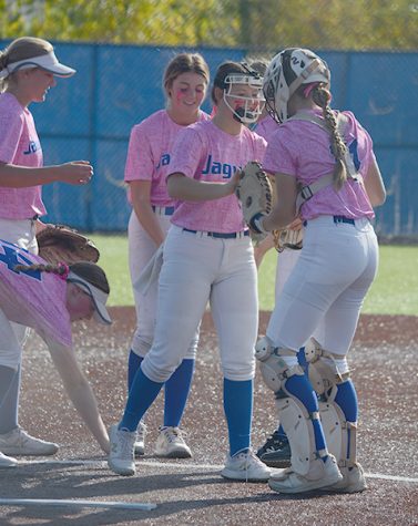 The Jags meet at the mound. They beat Lees Summit West 3 -2.

- Photo by Alex Miranda