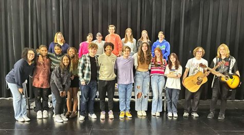 Performers pose for a group photo at the end of Open Mic Night. From poems to songs to forensics routines, students brought variety to the event. Photo submitted by Morgan Smith.