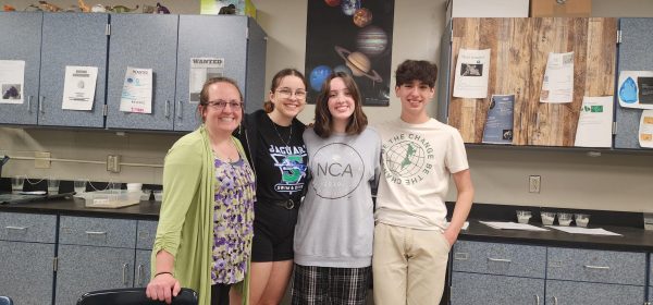 This is a picture of Mrs. Tolentino, Fabienne Eisoldt, Melania Richards, and Ian Garcia respectively. They worked on two experiments that were both picked by the Cubes in Space program.