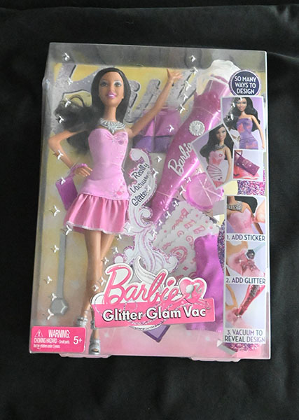 This is the Glitter Glam Vac Barbie Doll. Barbies have been a big influence to children and now its a big influence on the big screen.