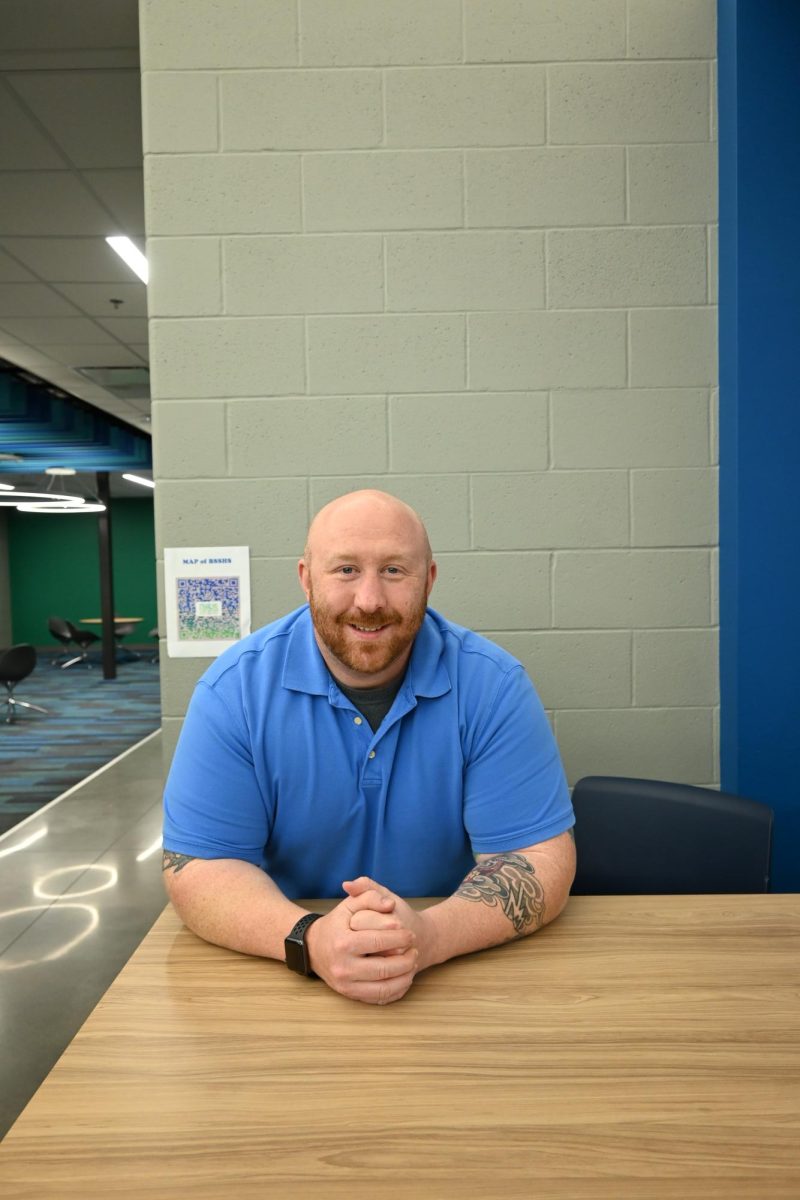 Nick Weinel is special education teacher at south. He likes working out with his wife. Photo by Jackson Large